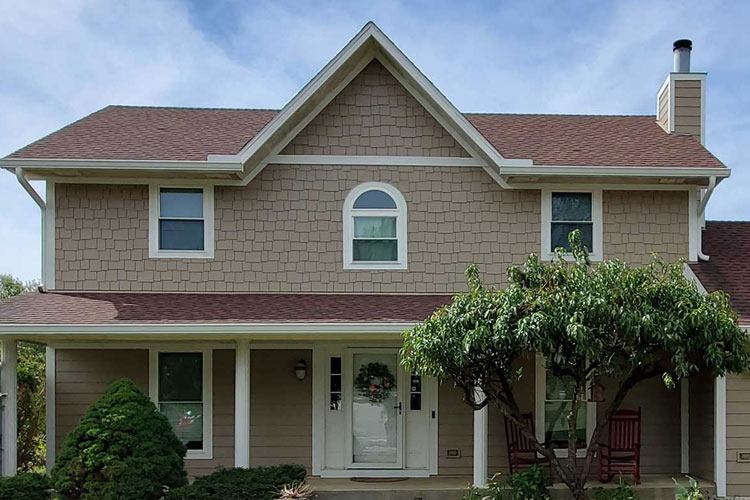 After house with new stone siding and roof